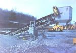 Conveyor lifts Materials from Bin