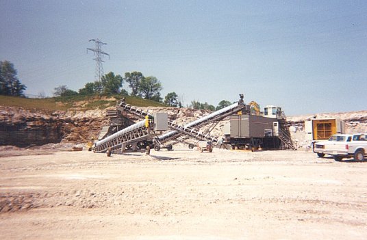 3 Stackers feeding Crusher and Screen before Overland transports to Plant